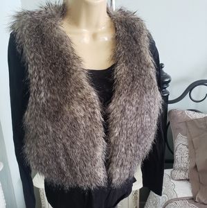 Faux fur vest by Kardashian Collection